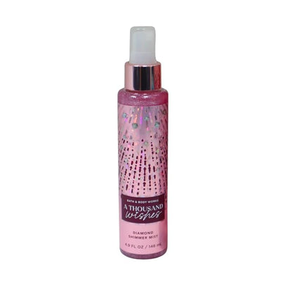 Bath & Body Works A Thousand Wishes Fine Fragrance Body Mist 8 oz & A Thousand Wishes Fine Fragrance Shimmer Body Mist 4.9 oz Gift Set packaging with a Red bow